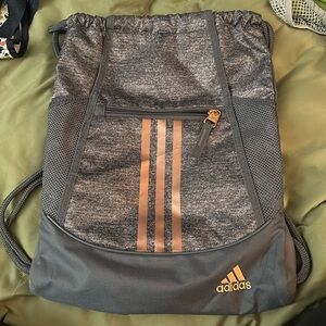 Grey with rose gold stripes adidas back pack like new many pockets